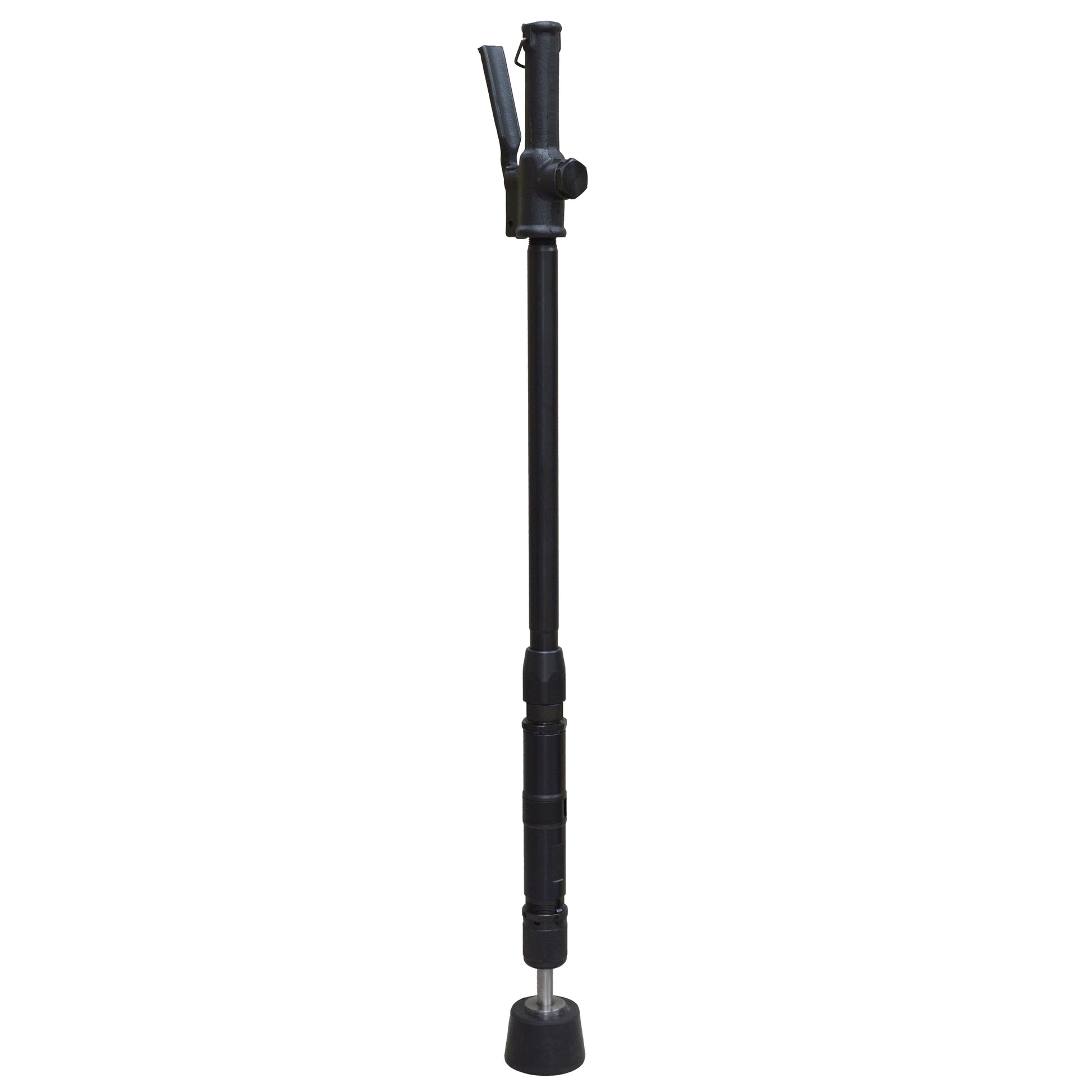 Black floor rammer tool with a long handle and a small base plate, used for compacting soil and sand.