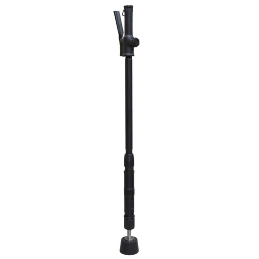 Black floor rammer tool with a long handle and a small base plate, used for compacting soil and sand.
